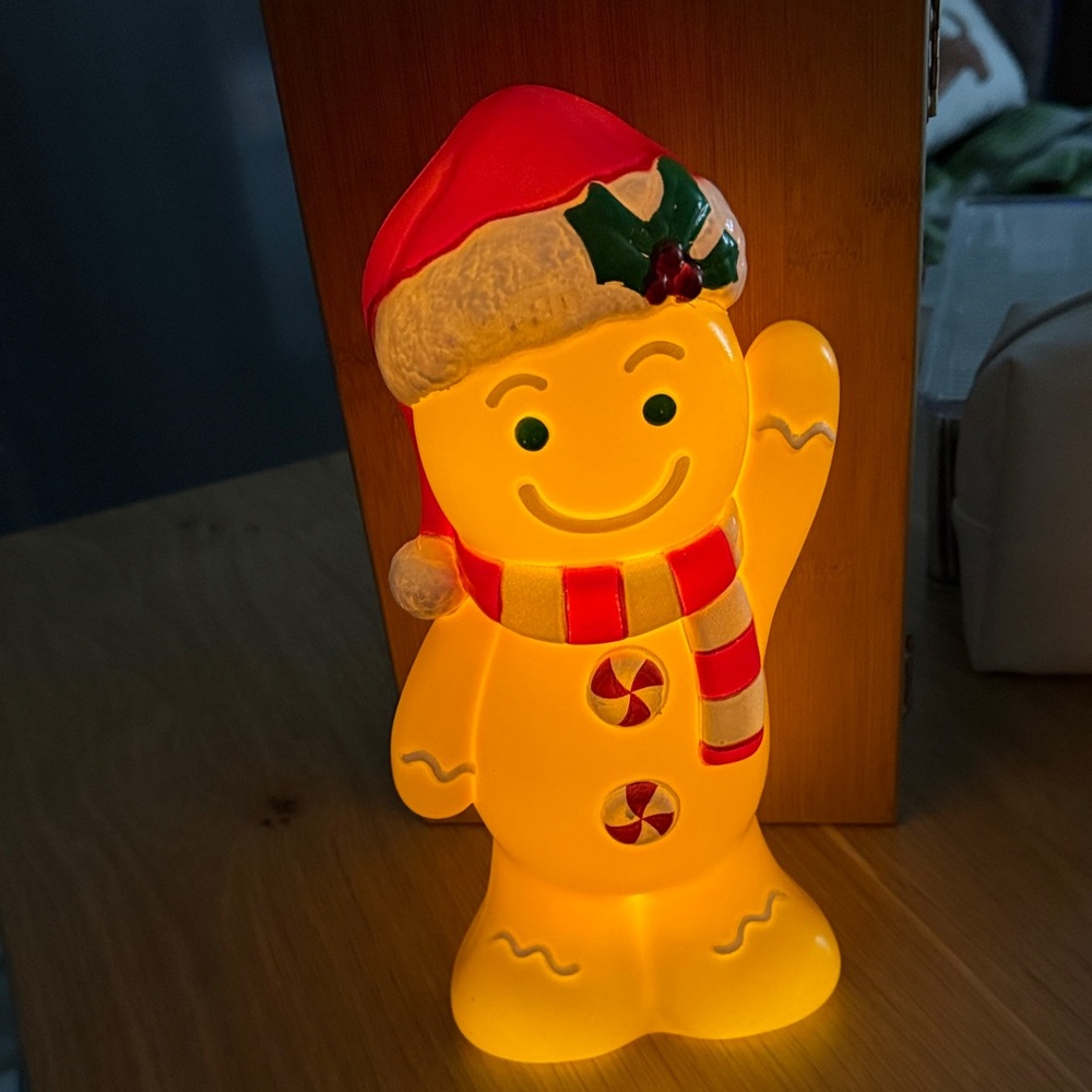 Cheerful Light-Up Snowman with Red Hat